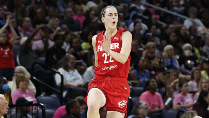 Indiana Fever guard Caitlin Clark (22) celebrates.