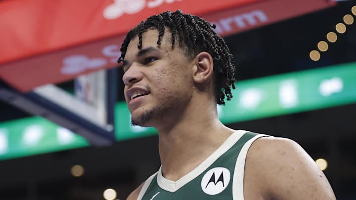 Milwaukee Bucks forward Ousmane Dieng (21) smiles after a play against the Oklahoma City Thunder during the second half at Paycom Center. Feb 12, 2026.
