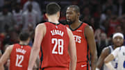 Nov 16, 2025; Houston, Texas, USA; Houston Rockets center Alperen Sengun (28) reacts with forward Kevin Durant (7) after making a basket during overtime against the Orlando Magic at Toyota Center. Mandatory Credit: Troy Taormina-Imagn Images