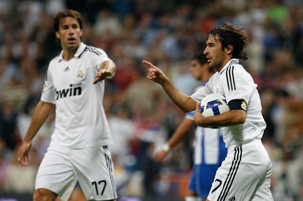 Raul celebrates with Real Madrid teammate Ruud van Nistelrooy