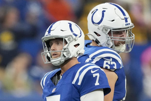 Indianapolis Colts kicker Matt Gay reacts after missing a field goal in a blue jersey.