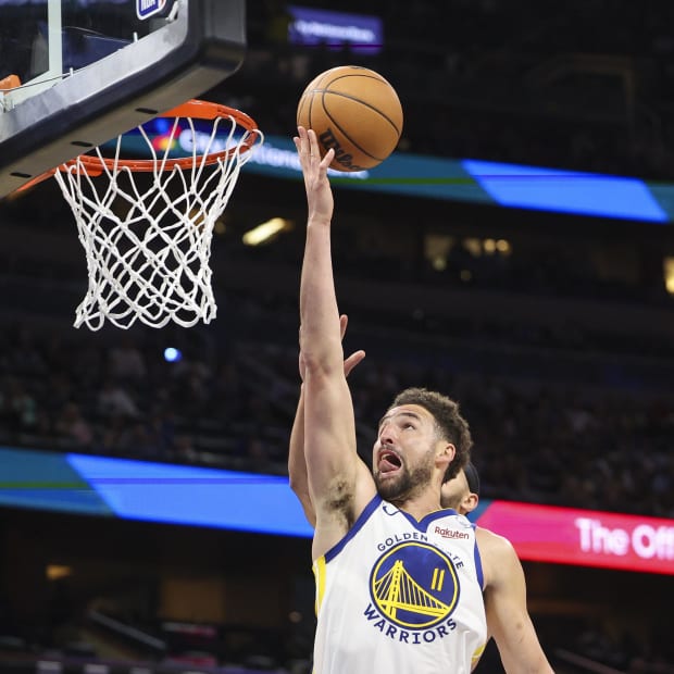Mar 27, 2024; Orlando, Florida, USA;  Golden State Warriors guard Klay Thompson (11) drives to the
