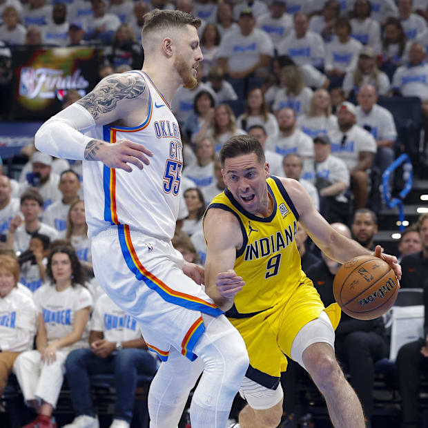 Indiana Pacers guard T.J. McConnell (9) drives to the basket past Oklahoma City Thunder center Isaiah Hartenstein Indiana Pacers guard T.J. McConnell (9) drives to the basket past Oklahoma City Thunder center Isaiah Hartenstein