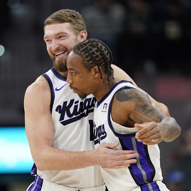 Sacramento Kings Center Domantas Sabonis (11) and Forward Dear derozan (10)