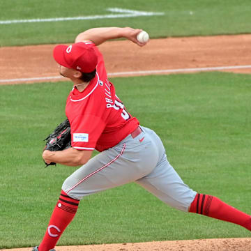 Feb 27, 2024; Mesa, Arizona, USA;  Cincinnati Reds starting pitcher Connor Phillips (34) throws in the third inning against the Chicago Cubs during a spring training game at Sloan Park. Mandatory Credit: Matt Kartozian-Imagn Images