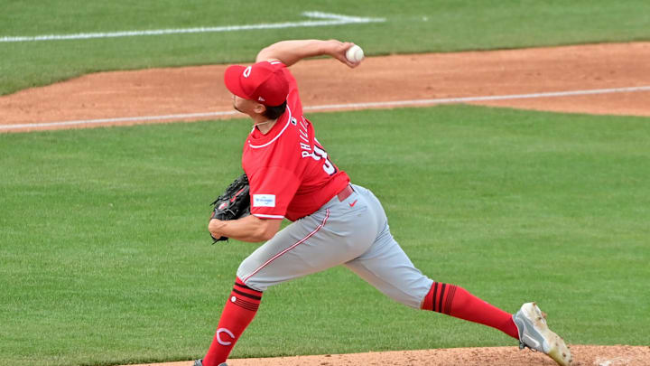 Feb 27, 2024; Mesa, Arizona, USA;  Cincinnati Reds starting pitcher Connor Phillips (34) throws in the third inning against the Chicago Cubs during a spring training game at Sloan Park. Mandatory Credit: Matt Kartozian-Imagn Images