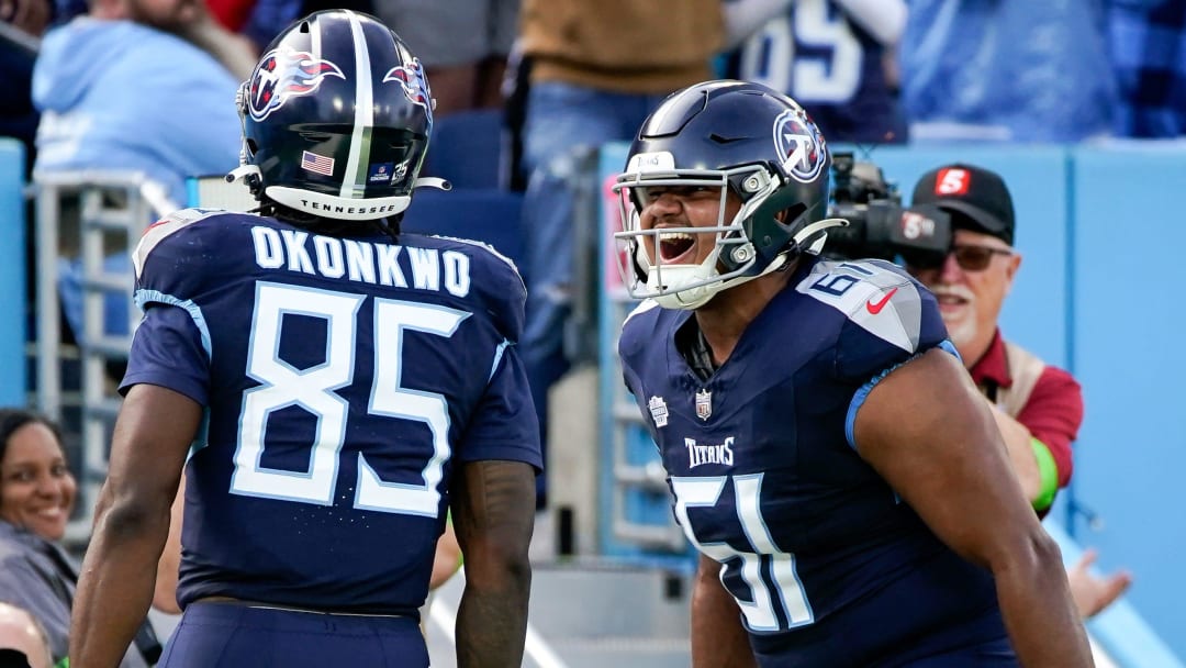 Tennessee Titans offensive tackle John Ojukwu (61) reacts after tight end Chigoziem Okonkwo (85) scored a touchdown against the Seattle Seahawks during the second quarter at Nissan Stadium in Nashville, Tenn., Sunday, Dec. 24, 2023.