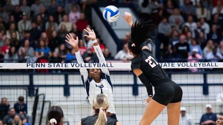 Nebraska's Harper Murray hits the ball over the net during Friday night's match against Penn State.