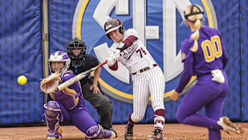 May 7, 2025; Athens, GA, USA; Mississippi St. catcher Ella Wesolowski (74) bats against LSU starting pitcher/relief pitcher Jayden Heavener (00) at Jack Turner Stadium. Mandatory Credit: Dale Zanine-Imagn Images