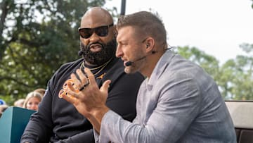 Former Gators Brandon Spikes, left, and Tim Tebow make an appearance on Marty and McGee as they do their show from Plaza of the Americas in Gainesville, FL on Saturday, October 4, 2025. [Alan Youngblood/Gainesville Sun]