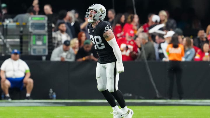 Nov 26, 2023; Paradise, Nevada, USA; Las Vegas Raiders defensive end Maxx Crosby (98) celebrates after sacking Kansas City Chiefs quarterback Patrick Mahomes (15) during the third quarter at Allegiant Stadium. Mandatory Credit: Stephen R. Sylvanie-USA TODAY Sports