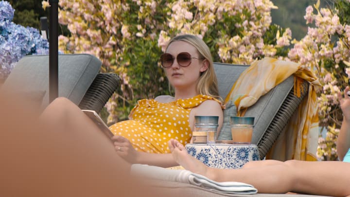 The Perfect Couple. Dakota Fanning as Abby Winbury in episode 101 of The Perfect Couple. Cr. Courtesy of Netflix © 2024