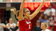 Nebraska middle blocker Rebekah Allick celebrates after the red team won the third set of the Red-White Scrimmage on Saturday.