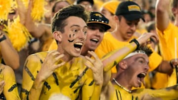 Sep 21, 2024; Columbia, Missouri, USA; Missouri Tigers fans celebrate after defeating the Vanderbilt Commodores in double overtime at Faurot Field at Memorial Stadium. Mandatory Credit: Jay Biggerstaff-Imagn Images