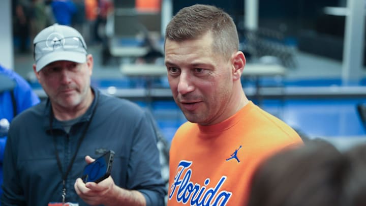 New Gator head football coach Jon Sumrall fires up the crowd during the first half an NCAA basketball game at Steven C. O'Connell Center Exactek arena in Gainesville, FL on Saturday, January 24, 2026. Auburn won 76-67 [Alan Youngblood/Gainesville Sun]
