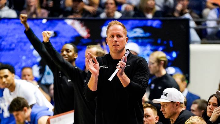 Jan 14, 2026; Provo, Utah, USA; BYU Cougars head coach Kevin Young reacts during the first half against the TCU Horned Frogs  at Marriott Center. Mandatory Credit: Aaron Baker-Imagn Images