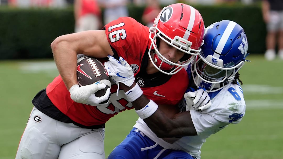 Georgia wide receiver London Humphreys (16) competes with Kentucky defensive back JQ Hardaway (6) during the first half of a NCAA college football game against Kentucky in Athens, Ga., on Saturday, October 4, 2025.