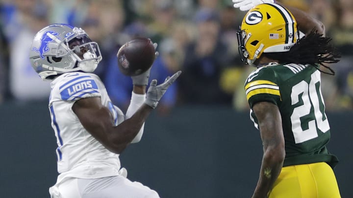 Sep 20, 2021; Green Bay, WIsconsin, USA; Detroit Lions wide receiver Quintez Cephus (left) pulls down a long reception against Green Bay Packers cornerback Kevin King (20) in the first quarter at Lambeau Field. Mandatory Credit: Dan Powers/Appleton Post-Crescent via USA TODAY NETWORK