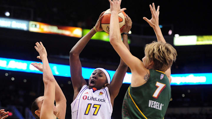 Aug 20, 2010; Phoenix, AZ, USA; Phoenix Mercury guard Sequoia Holmes (17) drives the ball against Seattle Storm forward Jana Vesela (7) and forward Svetlana Abrosimova during the first half at US Airways Center.  Mandatory Credit: Jennifer Stewart-Imagn Images