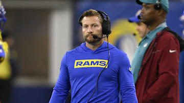 Nov 24, 2024; Inglewood, California, USA;  Los Angeles Rams head coach Sean McVay, center, watches from the sidelines during the second half against the Philadelphia Eagles at SoFi Stadium. Mandatory Credit: Alex Gallardo-Imagn Images