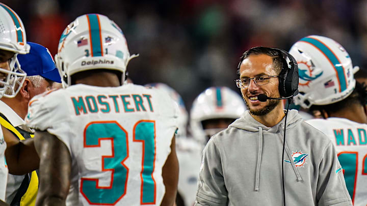 Miami Dolphins head coach Mike McDaniel reacts after a touchdown run by running back Raheem Mostert (31)