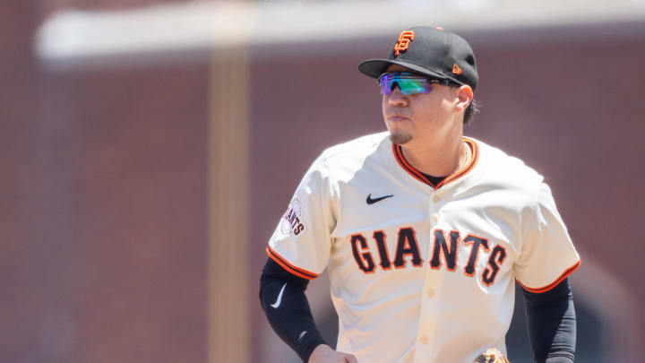 Jun 12, 2024; San Francisco, California, USA;  San Francisco Giants first base Wilmer Flores (41) makes a play at first during the fourth inning against the Houston Astros at Oracle Park. 