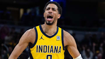 Mar 31, 2025; Indianapolis, Indiana, USA; Indiana Pacers guard Tyrese Haliburton (0) celebrates the game winning basket in the second half against the Sacramento Kings at Gainbridge Fieldhouse. Mandatory Credit: Trevor Ruszkowski-Imagn Images
