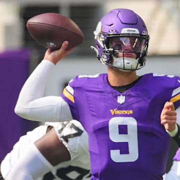 Aug 10, 2024; Minneapolis, Minnesota, USA; Minnesota Vikings quarterback J.J. McCarthy (9) passes against the Las Vegas Raiders in the second quarter at U.S. Bank Stadium.