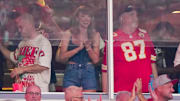 Sep 5, 2024; Kansas City, Missouri, USA; Recording artist Taylor Swift cheeers next to George Kelce during the first half of the game between the Kansas City Chiefs and Baltimore Ravens at GEHA Field at Arrowhead Stadium. Mandatory Credit: Denny Medley-Imagn Images