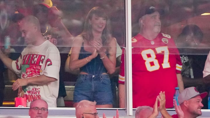 Sep 5, 2024; Kansas City, Missouri, USA; Recording artist Taylor Swift cheeers next to George Kelce during the first half of the game between the Kansas City Chiefs and Baltimore Ravens at GEHA Field at Arrowhead Stadium. Mandatory Credit: Denny Medley-Imagn Images