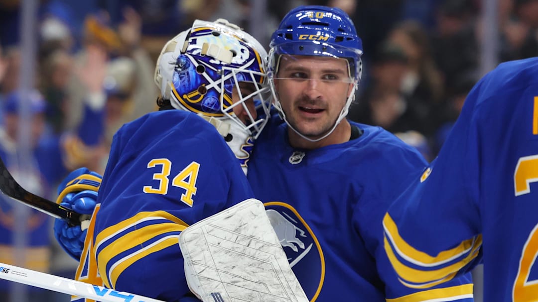 Buffalo Sabres goaltender Alex Lyon and center Sam Carrick Buffalo Sabres goaltender Alex Lyon and center Sam Carrick
