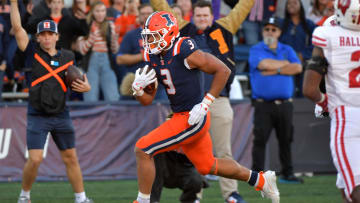 Oct 21, 2023; Champaign, Illinois, USA;  Illinois Fighting Illini running back Kaden Feagin (3) scores a touchdown during the second half against the Wisconsin Badgers at Memorial Stadium. Mandatory Credit: Ron Johnson-USA TODAY Sports