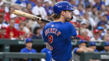 Jul 12, 2024; St. Louis, Missouri, USA;  Chicago Cubs second baseman Nico Hoerner (2) drives in a run as he ground out against the St. Louis Cardinals during the third inning at Busch Stadium.