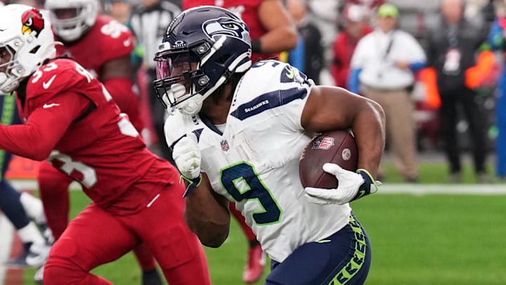 Jan 7, 2024; Glendale, Arizona, USA; Seattle Seahawks running back Kenneth Walker III (9) runs against the Arizona Cardinals during the first half at State Farm Stadium. Mandatory Credit: Joe Camporeale-Imagn Images