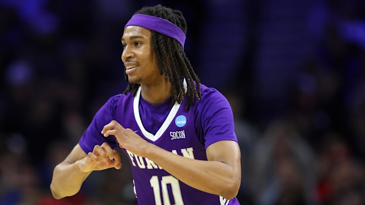 Mar 20, 2026; Philadelphia, PA, USA; Furman Paladins guard Alex Wilkins (10) reacts against the UConn Huskies in the first half during a first round game of the men's 2026 NCAA Tournament at Xfinity Mobile Arena. Mandatory Credit: Bill Streicher-Imagn Images
