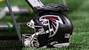 Aug 15, 2025; Atlanta, Georgia, USA; Atlanta Falcons helmet on the sideline against the Tennessee Titans in the first quarter at Mercedes-Benz Stadium. Mandatory Credit: Brett Davis-Imagn Images

