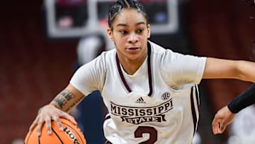 Mississippi State guard Jerkaila Jordan (2) moves the ball past Texas A & M guard Tineya Hylton (3) during the third quarter of the SEC Women's Basketball Tournament game three at the Bon Secours Wellness Arena in Greenville, S.C. Thursday, March 7, 2024.