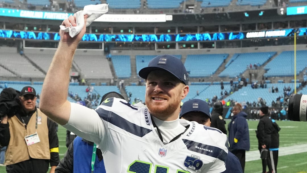 Dec 28, 2025; Charlotte, North Carolina, USA; Seattle Seahawks quarterback Sam Darnold (14) reacts after the game at Bank of America Stadium.