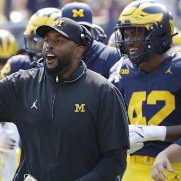 Sep 14, 2024; Ann Arbor, Michigan, USA;  Michigan Wolverines head coach Sherrone Moore reacts on the sideline during the second half against the Arkansas State Red Wolves at Michigan Stadium. Mandatory Credit: Rick Osentoski-Imagn Images