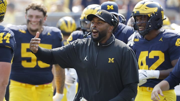 Sep 14, 2024; Ann Arbor, Michigan, USA;  Michigan Wolverines head coach Sherrone Moore reacts on the sideline during the second half against the Arkansas State Red Wolves at Michigan Stadium. Mandatory Credit: Rick Osentoski-Imagn Images