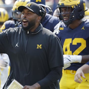 Sep 14, 2024; Ann Arbor, Michigan, USA;  Michigan Wolverines head coach Sherrone Moore reacts on the sideline during the second half against the Arkansas State Red Wolves at Michigan Stadium. Mandatory Credit: Rick Osentoski-Imagn Images