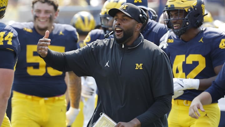 Sep 14, 2024; Ann Arbor, Michigan, USA;  Michigan Wolverines head coach Sherrone Moore reacts on the sideline during the second half against the Arkansas State Red Wolves at Michigan Stadium. Mandatory Credit: Rick Osentoski-Imagn Images