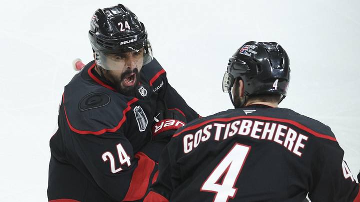 Jun 4, 2026; Raleigh, North Carolina, USA; Carolina Hurricanes right wing Seth Jarvis (24) celebrates scoring in overtime with defenseman Shayne Gostisbehere (4) against the Vegas Golden Knights in game two of the 2026 Stanley Cup Final at Lenovo Center. Mandatory Credit: Nathan Ray Seebeck-Imagn Images