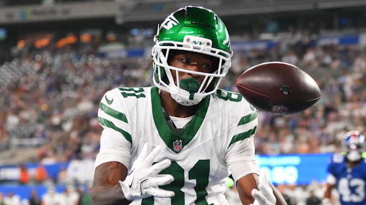 Aug 16, 2025; East Rutherford, New Jersey, USA; New York Jets wide receiver Ontaria Wilson (81) attempts to make a catch on a two-point conversion against the New York Giants during the second half at MetLife Stadium. The attempt would fail. Mandatory Credit: Rich Barnes-Imagn Images Aug 16, 2025; East Rutherford, New Jersey, USA; New York Jets wide receiver Ontaria Wilson (81) attempts to make a catch on a two-point conversion against the New York Giants during the second half at MetLife Stadium. The attempt would fail. Mandatory Credit: Rich Barnes-Imagn Images