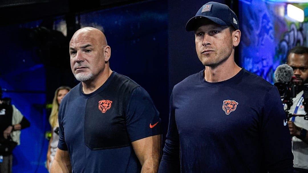 Chicago Bears head coach Ben Johnson walks out of the tunnel to watch warm up at Ford Field in Detroit on Sunday, Sept. 14, 2025.