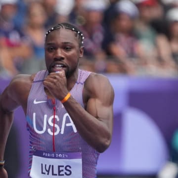 Aug 3, 2024; Paris, FRANCE; Noah Lyles (USA) in a men's 100m round 1 heat during the Paris 2024 Olympic Summer Games at Stade de France. Mandatory Credit: Kirby Lee-USA TODAY Sports