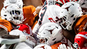 Texas defense collides with Georgia offense in the third quarter of the Longhorns' game against the Georgia Bulldogs at Darrell K. Royal Texas Memorial Stadium in Austin, Oct. 19, 2024.