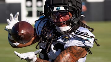Jacksonville Jaguars safety Cam'Ron Silmon-Craig (32) hauls in a pass while running drills during an NFL training camp fifth session at the Miller Electric Center, Monday, July 28, 2025, in Jacksonville, Fla. [Doug Engle/Florida Times-Union]