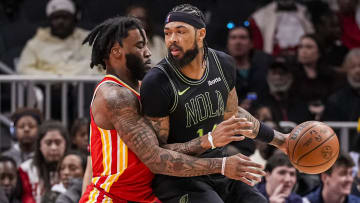 Mar 10, 2024; Atlanta, Georgia, USA; New Orleans Pelicans forward Brandon Ingram (14) dribbles guarded by Atlanta Hawks forward Saddiq Bey (41) during the first half at State Farm Arena.