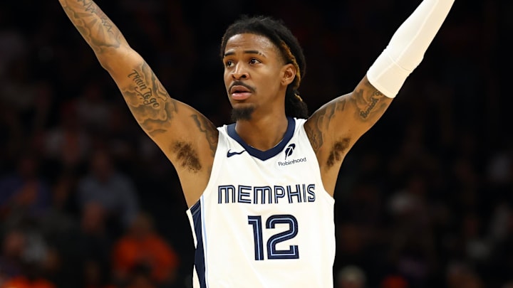 Oct 29, 2025; Phoenix, Arizona, USA; Memphis Grizzlies guard Ja Morant (12) reacts against the Phoenix Suns during the second half at the Mortgage Matchup Center. Mandatory Credit: Mark J. Rebilas-Imagn Images